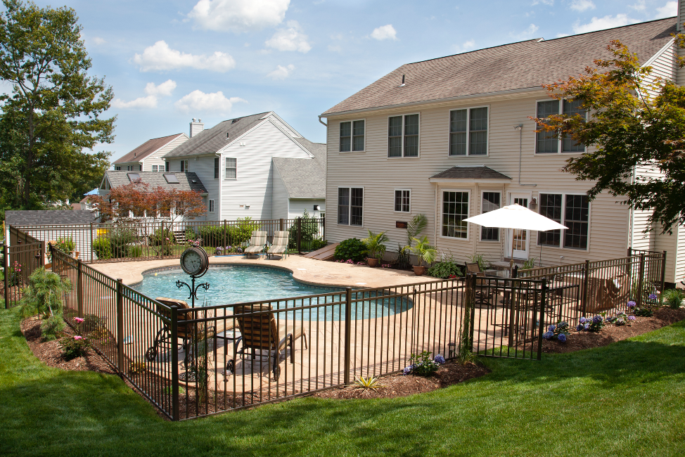 Metal fence around a backyard pool in Arlington Heights, Illinois