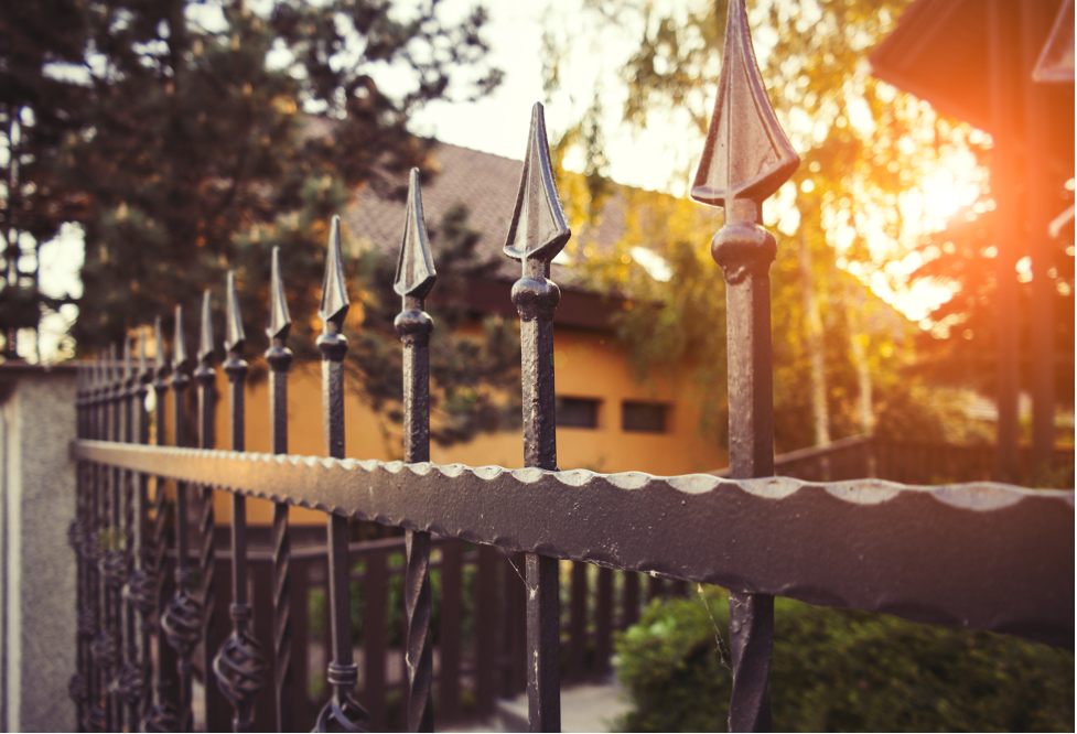 Metal fence around a house in Golf, Illinois