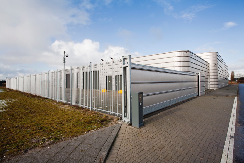 Metal security fence around a commercial property in Arlington Heights, Illinois